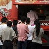 Foreigners at fast-food outlets can stay till permits expire