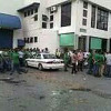 Workers torch car in ‘stone volleyball’ riot